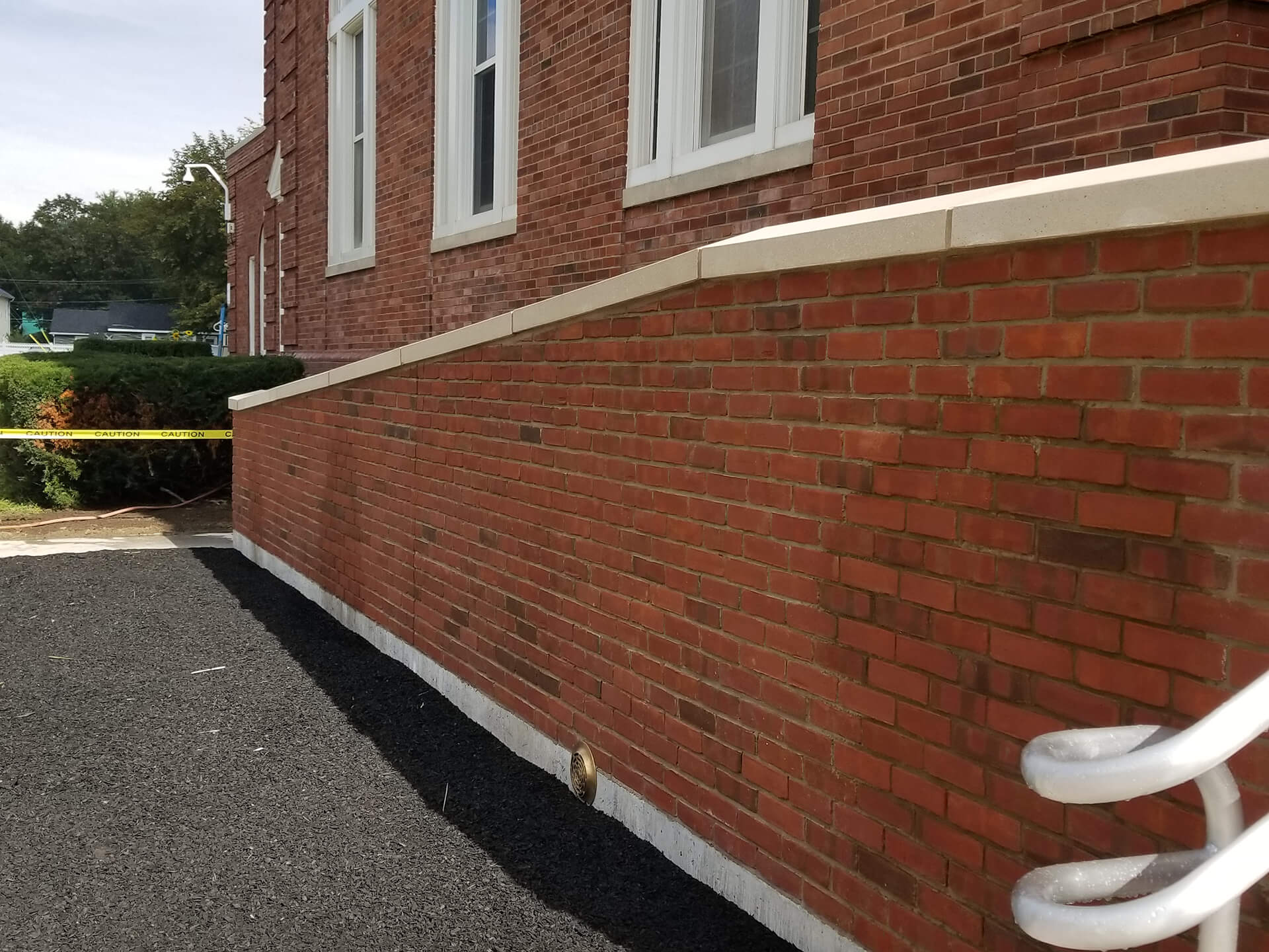 Brick building with sloped entry ramp