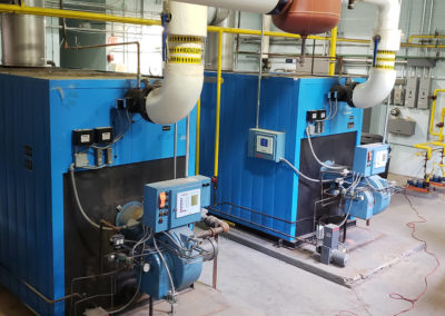 Large boilers in a utility room