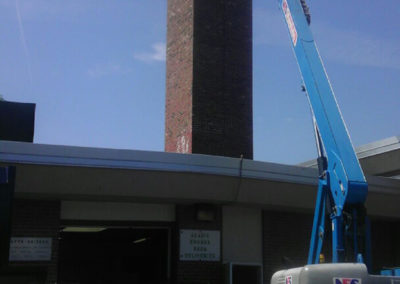 Contractor working on a chimney